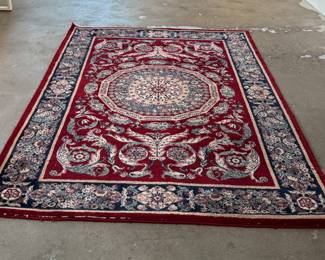 This lot features a Persian style rug that measures, 94” H x 63” W. 
