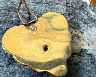This lot features a 14k gold heart pendant with a total approx. weight of 1.82 grams. Signed, "HANA" as shown in photos.
