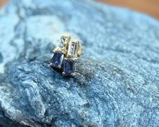 This lot features a pair of 10k gold earrings, each with a few diamonds and a sapphire center stone. This pair has a total approx. weight of 2.30 grams.
