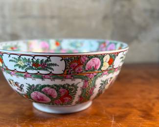 This lot features an antique Chinese rose medallion bowl in excellent condition that measures, 5.5” H x 12” W x 12” D. Marked underneath, "Overjoy" which is generally associated with porcelain that was hand-painted in Hong Kong.
