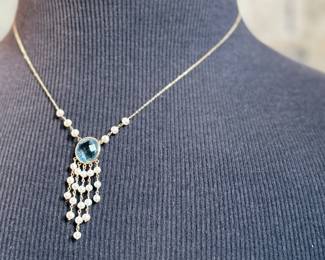 This lot features a stunning antique 14k gold necklace, possibly Edwardian with what appears to be Aquamarine and surrounded Pearls. This necklace measures 18” with a total approx. weight of 4.70 grams.
