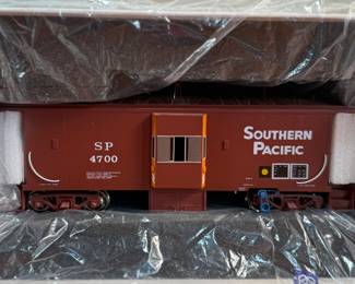 This lot features an Overland Models O Scale Brass SP ‘C50-9’ B-W Caboose. Built in Korea by Ajin Precision Mfg. Comes in original packaging.
