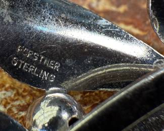 This lot features a vintage sterling silver brooch manufactured and signed by Forstner with a total approx. weight of 7.03 grams.
