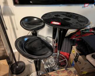 $150 Modern Black Pub Table with Bar Stools
Modern black pub table set with chrome accents and two matching bar stools. Perfect for small dining spaces, kitchen breakfast nook, or home bar area. Contemporary furniture, space-saving design, adjustable height stools.