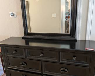 $500 Black Dresser with Mirror - 7 Drawer
Beautiful black wooden dresser with matching framed mirror. Seven spacious drawers with decorative hardware. Classic bedroom furniture, traditional dresser, storage furniture.