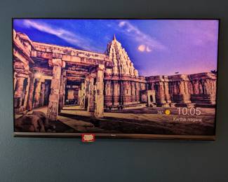 $500 Hisense 65" 4K Smart TV Wall Mounted
Large Hisense 65-inch 4K UHD smart television wall-mounted on dark teal/blue wall. Excellent picture quality display, slim bezel design. Perfect for home theater, living room, gaming setup. Large screen TV, wall mount TV, 4K television, smart TV, home entertainment system, Hisense TV.