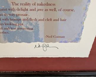 Close-up of Signed Neil Gaiman Art Print
Detail shot showing Neil Gaiman signature and quote on limited edition art print by Olivia De Berardinis. Collectible signed artwork, literary collectible, framed print.