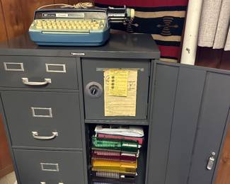 Files cabinet with a safe