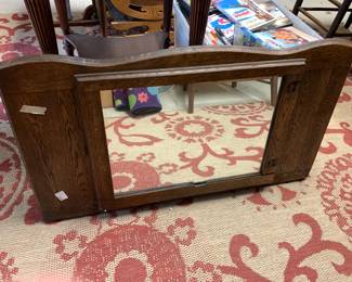 #82 wall hanging mirror with oak frame $30.00