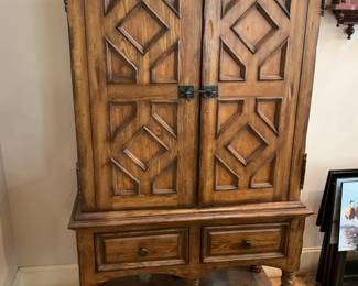 #9 entertainment center wit2 shelves 2 drawers 2 doors and barley twist leg 41x2072 $175.00