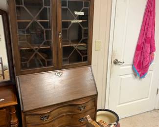 #74 sectary with 4 drawers flip down desk 2 glass doors as is loose back leg & finish 30x17x80 $75.00