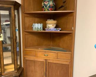 #154 corner cabinet with 1 drawer 2 doors 3 shelves 42x20x88 as is door off $100.00