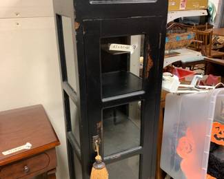 #131 black display cabinet with glass door 3 shelves 15x13x60 key lock $100.00
