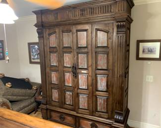 #33 large cabinet with 2 shelves 2 folding doors distress 2 drawers 79x27x103 you move $175.00