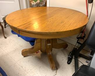 #163 oak round pedestal table 45x29 $75.00