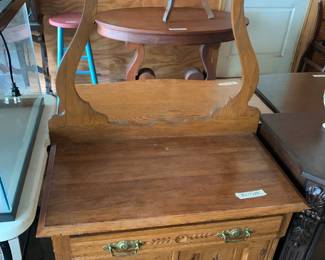 #99 oak wash stand 31x17x28 3 drawers 1 door with key rack 24 tall $125.00