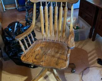 #331 Wood Rolling Office Chair that swivels $75.00