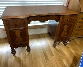 #22 4 drawer desk on wheels 44x18x30 $75.00