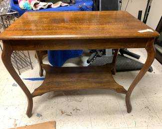 #162 oak library table with shelf 38x24x31 $125.00