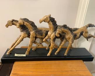 #67 4 horse statue on wood base 24L x13Tx $45.00
