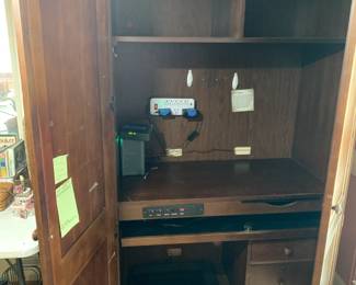 #21 computer cabinet 2doors, plugs and shelves 42x22x78 $175.00