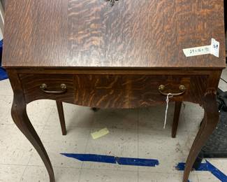 #164 oak desk with flip down front 1 drawer on qa leg as is leg 29x16x40 $45.00