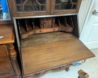#74 sectary with 4 drawers flip down desk 2 glass doors as is loose back leg & finish 30x17x80 $75.00