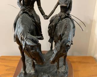 #64 Montana lifestyle 2 trails turns 1 road man and women metal 12 tall $90.00