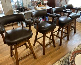 #20 4 bar stool 31 tall leather with cow décor swivel $300.00