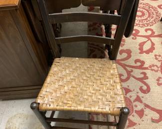 #78 black painted basket seat dining chair $25.00