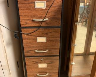 #115 4 drawer metal file cabinet 15x18x52 $25.00