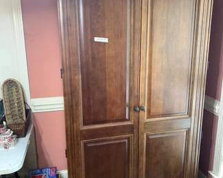 #21 computer cabinet 2doors, plugs and shelves 42x22x78 $175.00