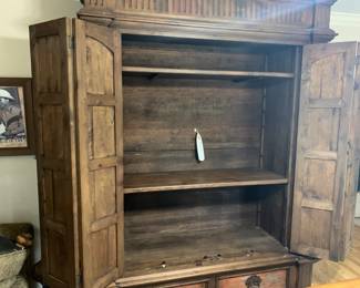 #33 large cabinet with 2 shelves 2 folding doors distress 2 drawers 79x27x103 you move $175.00