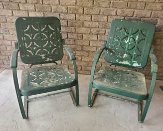 Green metal chairs