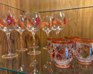 Hand painted autumn-themed wine glasses, autumn candle holders.