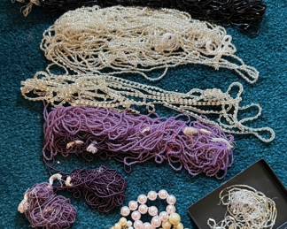 Various craft supplies including beads.