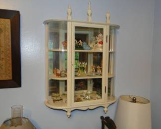 Miniature curio cabinet with miniatures