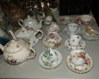 Tea cup collection and teapots