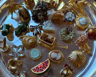 Estee, Lauder pill boxes, and ornaments