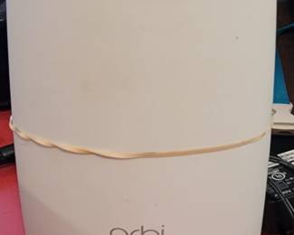 Router - for wifi, not for woodworking projects. Also, the rubber band has nothing to do with anything and I don't know why it's there.