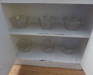 Glass globes for wrought iron chandelier