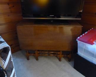 Antique drop leaf dining table