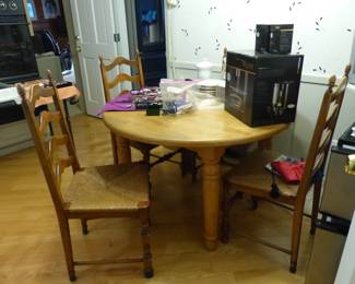 Kitchen table with 4 ladderback rush seat chairs, kitchenware