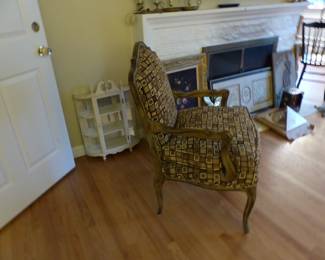 Bergere chair, small wall curio cabinet, bric-a-brac, framed pictures