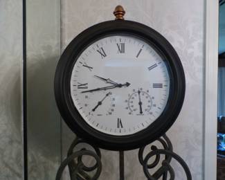 Wrought iron standing tall clock
