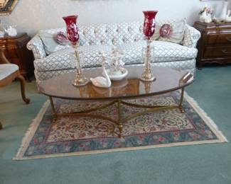 Traditional tufted back sofa, oval coffee table, pair of accent chairs, pair of Karges side chests, pair of mirrors, oil painting signed by Joan Giralt Lerin, pair of lamps