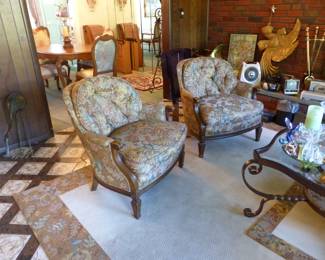 Sofa, coffee table pair of accent chairs, pair of floor lamps, area rug, bric-a-brac
