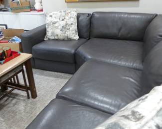 Chateau d'Ax Italian leather sectional sofa, coffee table with slide out benches