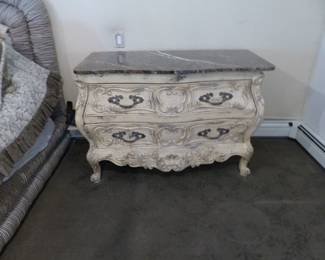 King size upholstered bed with box spring/mattress, bedding & accent pillows, pair of marble top Bombay chests, pair of iron benches