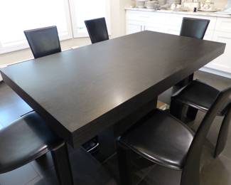 Contemporary designer dining table with 6 designer leather chairs